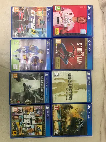 Bundle of 8 PS4 Games — FIFA 20, Spider-Man, Uncharted Collection, GTA V, and more