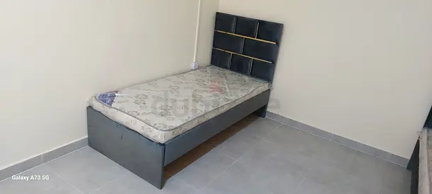 Single grey upholstered bed frame with mattress - good quality