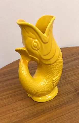 yellow ceramic fish pitcher / vase