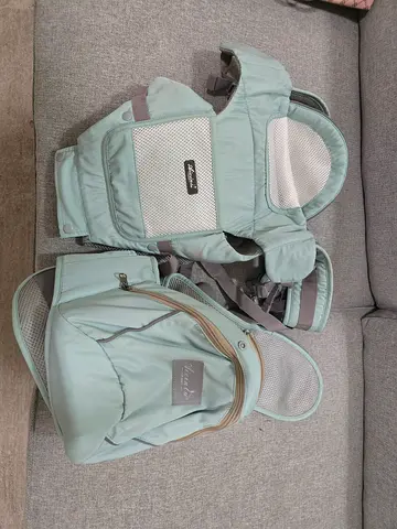 Light Green Baby Carrier with Matching Diaper Backpack - Gently Used