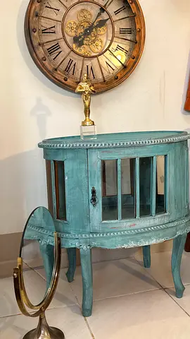 Vintage turquoise half-moon console table with glass panels