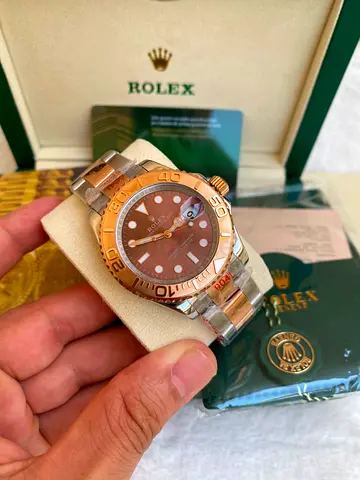 This appears to be a Rolex Yacht-Master 40 with a chocolate dial and a steel and rose gold (Everose