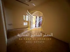 One-bedroom apartment with a living room and balcony in Abu Shagara, available for annual rent. Suit