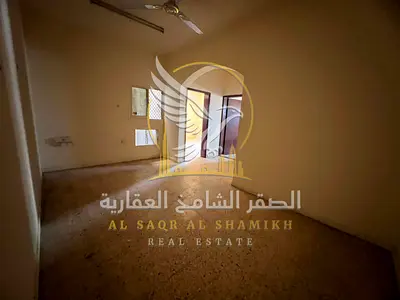 One-bedroom apartment with a living room and balcony in Abu Shagara, available for annual rent. Suitable for single men.
