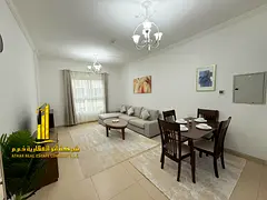 Luxury second-bedroom apartment with a living room and open balcony. Ajman, Jasmine Towers. Fully fu