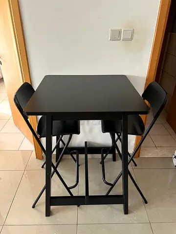 Compact black dining table with 2 tall chairs - good condition