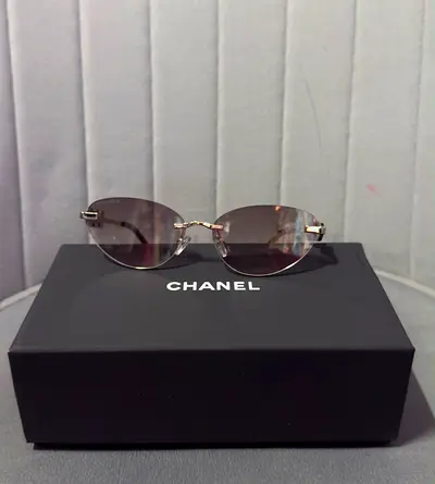 Chanel rimless oval sunglasses with original box