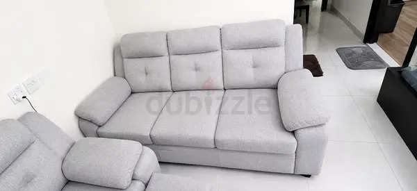 Light grey 3-seater fabric sofa in good condition