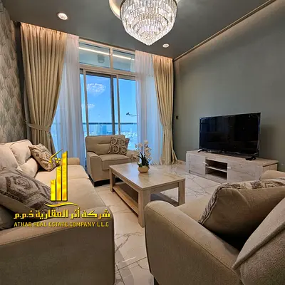 Luxury two-bedroom furnished apartment for annual rent in Ajman - Al Rashidiya 1 - Oasis Towers - High-end finishes and prime location