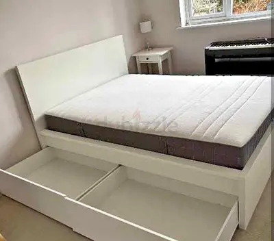 Ikea Double bed with mattress available in perfect condition no any demagh are broken Size is 140/20