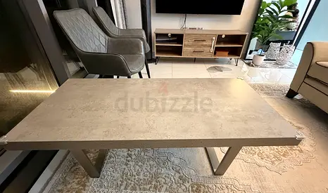 Modern rectangular coffee table with concrete-look top