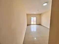 Two bedrooms and a living room in Al Jurf 2 - spacious layout - balcony with a stunning view - fully