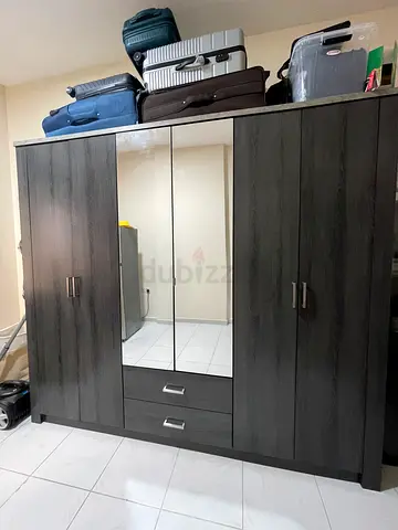 Pan homes Dark wood 3-door wardrobe with mirror and drawers - good condition