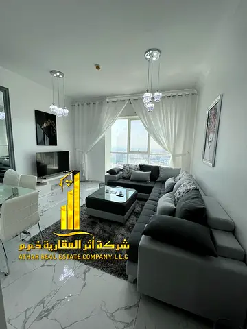 Luxury apartment, second occupancy. One bedroom, living room, and balcony . Ajman, Oasis Tower. Includes gym and swimming pool.