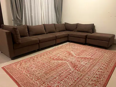 Brown L-shaped Sofa with Ottoman - Good Condition