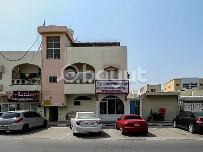 For sale, a commercial building, ground floor, and roof, in Ajman, Al Nuaimiya area