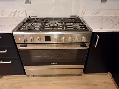 Bosch gas cooker 90x60cm like new neat and clean condition
