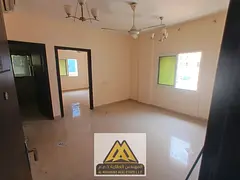 One-bedroom apartment with living room in Al Alia, new building, split AC, close to services and Dub