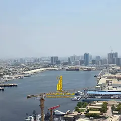 Luxury apartment, second occupancy, two bedrooms, living room, and open balcony. Ajman, Oasis Tower.