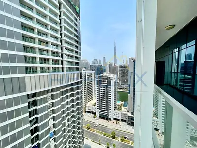 Fully Furnished 2BR | Partial Burj Khalifa & Canal View | Vacant
