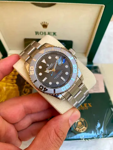 This Rolex Yacht-Master 40 (Ref. features a slate grey dial paired with a bidirectional platinum r