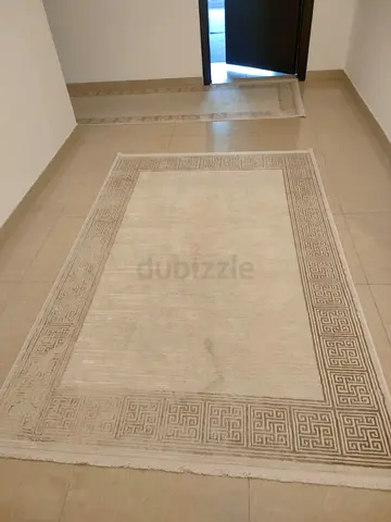 Set of 10 Beige Decorative Rugs with Geometric Edge Patterns – Good Condition