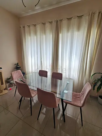 Glass Top Dining Table with 6 Pink Velvet Chairs - Good Condition