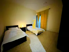 Luxurious two-bedroom apartment with a living room, fully furnished with brand new, high-end furnitu