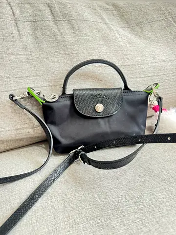 Small black Longchamp Le Pliage crossbody bag with detachable strap