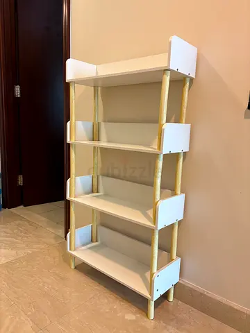 White wooden 4-tier shelving unit