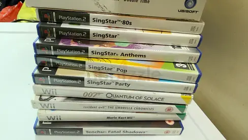 Mixed Used PlayStation 2 & Wii Game Collection (10 discs)