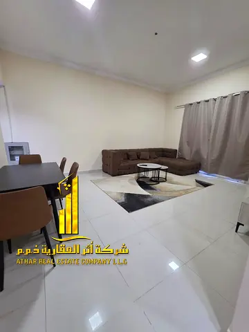 Luxury second-bedroom apartment with a living room and open balcony. Ajman, Al Muwaihat. Fully furnished, available for monthly rent.