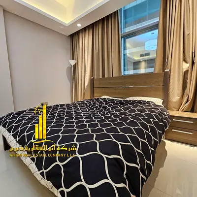 Luxurious one-bedroom apartment in Ajman - Al Rashidiya 1 - Gulfa Tower - furnished with hotel-style furniture for monthly rent