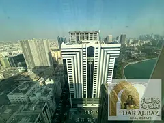 Apartment for annual rent in Al Majaz 1. The apartment has two bedrooms, a living room, a master bed