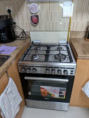 Premium Italian freestanding gas oven and 4-burner hob - stainless steel. Oven brand-new.