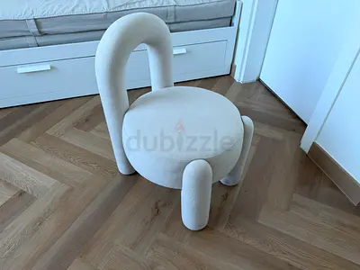 Unique Curved Accent Chair in Cream Upholstery