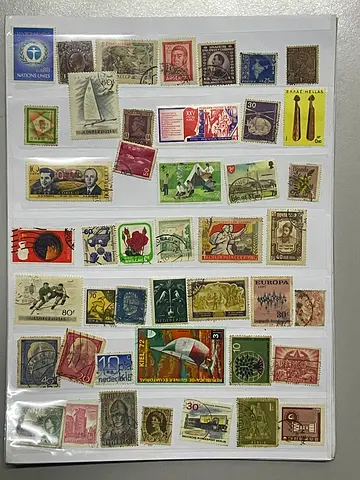 Mixed World Stamp Collection - Assorted Used Stamps on Album Page