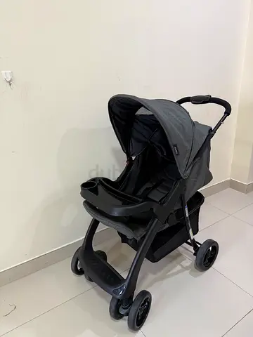 Gray lightweight standard baby stroller in good condition