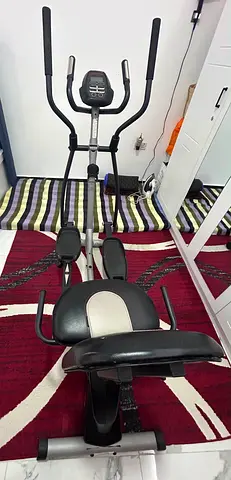 Used Elliptical Trainer with adjustable Seat and paddle — Good Working Condition