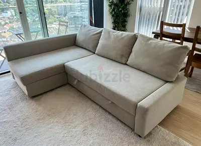 Grey L-Shaped Sofa Bed with Pull Out Section