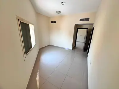 One-bedroom apartment with living room – Al Rawda 1, behind Al Hamidiya Police Station – Master bed