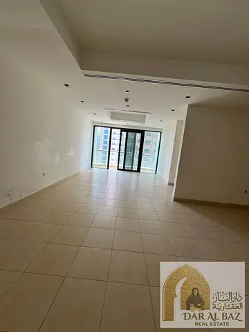Two-bedroom apartment with a living room for annual rent in Al Mamzar, Sharjah. The apartment has a sea view overlooking the lake, a maid's room, free