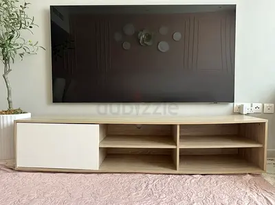 Low wooden TV cabinet with white openable door - light oak finish