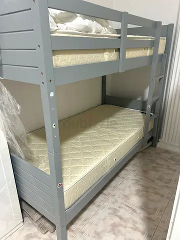 Wooden grey bunk bed with two mattresses, good used condition