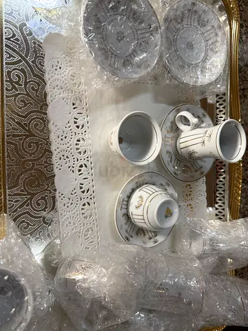 Decorative porcelain tea set with serving trays (used)24 pieces
