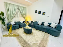Luxury apartment, second occupancy, one bedroom and living room with a balcony and open view. Ajman,