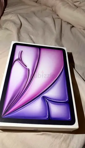 Apple iPad (boxed) - Purple wallpaper shown, unused condition
