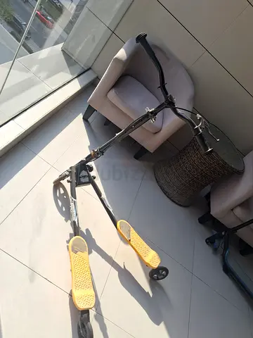 Yellow and Black Three-Wheel Slider Scooter