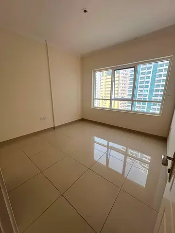 Master Bedroom and Living Room for Annual Rent in Al Tarfa Prime location near Al Rolla, close to all essential services and amenities.