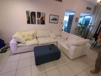 As perfect condition feather filled modular sofa